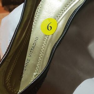 Black flats by Adrienne Vittadini